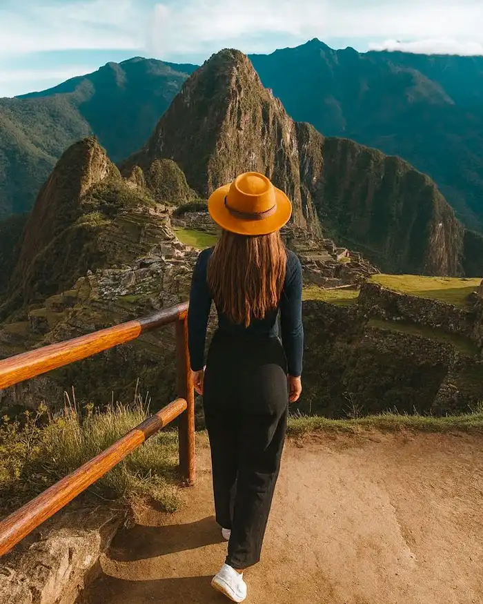 Group of travelers visiting Machu Picchu in Peru